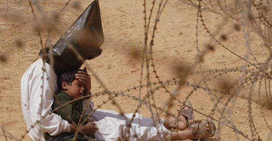 La foto dell'Anno 2003 é di Jean-Marc Bouju, Francia, fotografo dell??Associated Press La foto dell'Anno 2003 é di Jean-Marc Bouju, Francia, fotografo dell??Associated Press