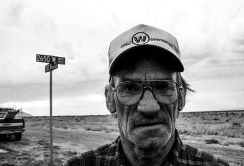WORKER. ATOMIC CITY (POPULATION 29), IDAHO. 2003